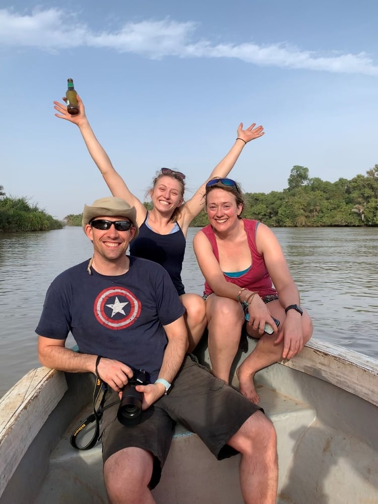 A group of people on a boat
Description automatically generated